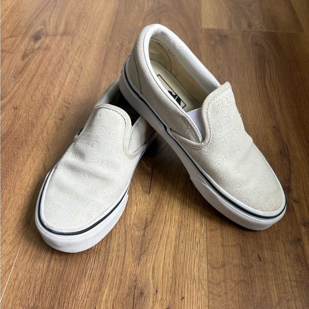 Vans Cream Slip-On Sneakers